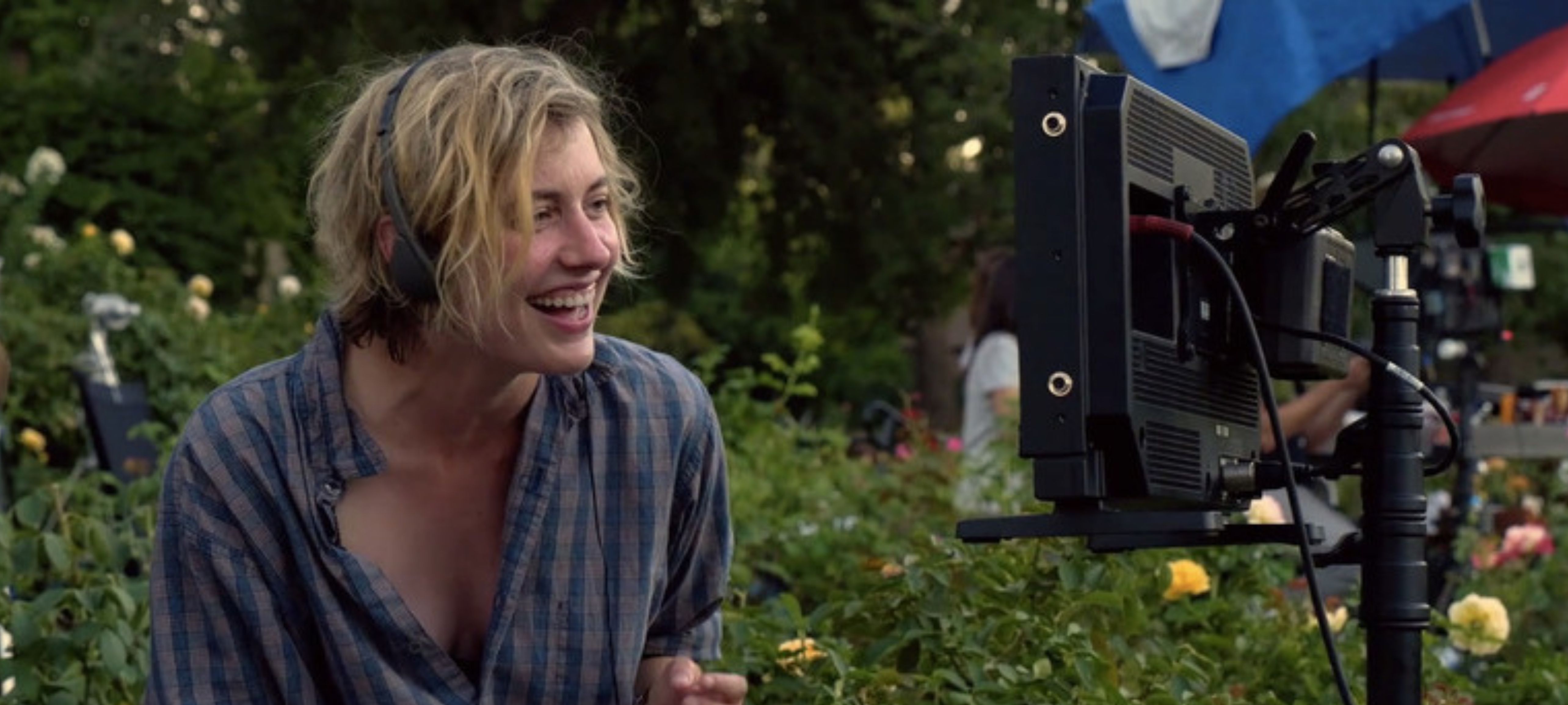 Greta Gerwig on set working with camera. 